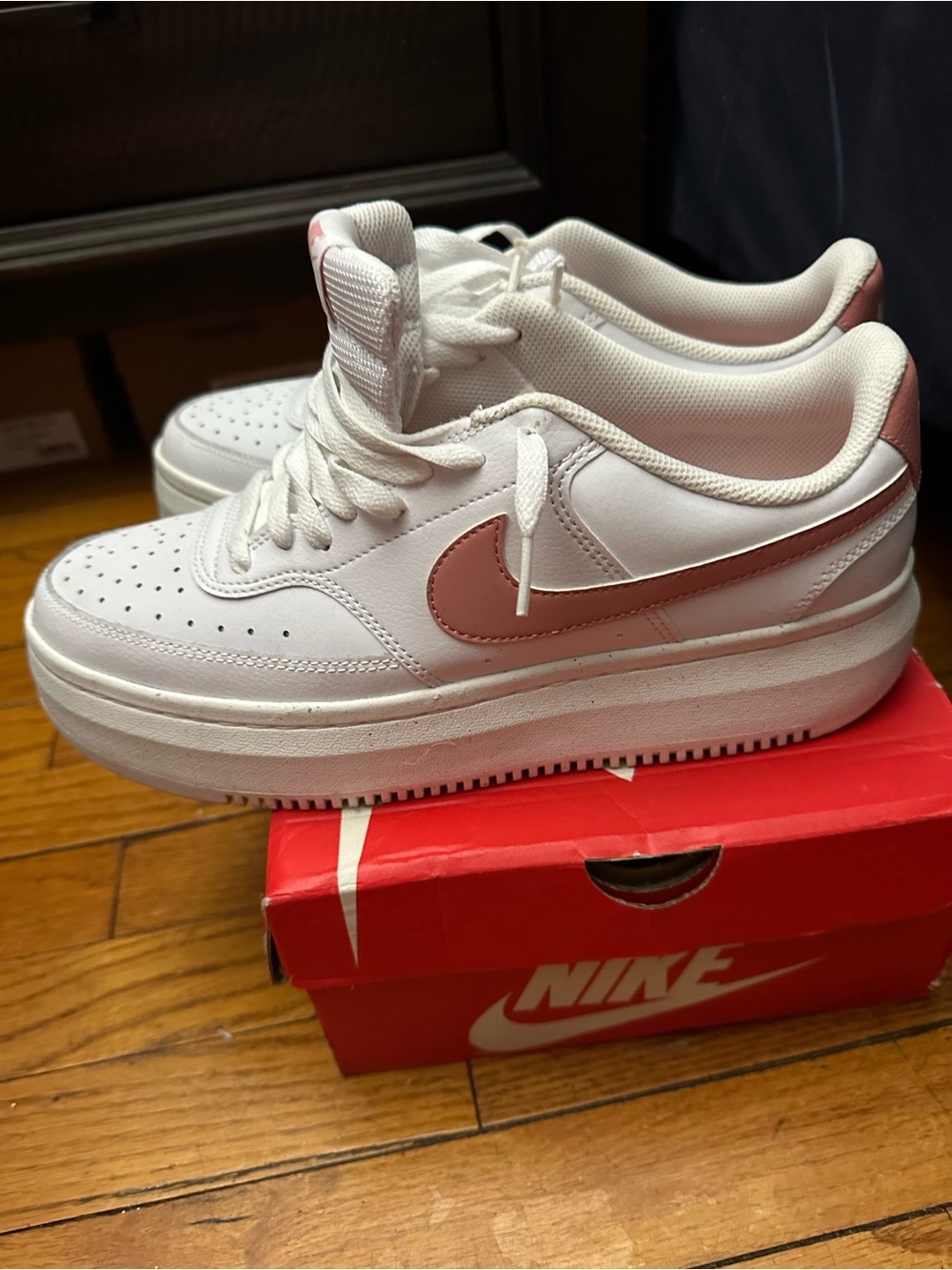 Nike White Low-Top Sneakers with Pink Swoosh